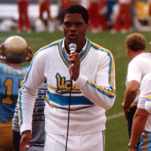 On the mike during a Nebraska vs. UCLA football game at the Rose Bowl in 1984.